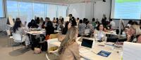Workshop attendees in small group discussions